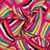 Tissu Viscose satiné Op art sur fond Rose fuchsia