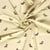 Tissu Jersey Coton imprimé Inès happy dino sur fond Beige