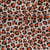 Tissu Toile de Coton aspect lin Léopard orange et noir sur fond Naturel
