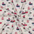 Tissu Jersey Coton mélangé Nolan petits bateaux sur fond Gris clair