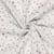 Tissu Double gaze de Coton Fleuris pastel sur fond Ecru