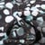 Tissu Viscose Aqua Eucalyptus sur fond Noir
