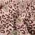Tissu Double gaze de Coton Motif Léo et coeur sur fond Vieux rose