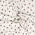 Tissu Jersey 100% Coton ajouré Baby petites fleurs sur fond Ecru