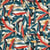 Tissu Toile Cretonne  feuilles bleues pétrole Tamoa sur fond Beige sable - Au mètre