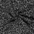 Tissu Jacquard toucher laine Éris léopard Noir sur fond Gris clair
