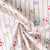 Tissu Coton imprimé Arty Cerises et rayures sur fond Blanc cassé