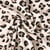 Tissu Sweat envers molletonné Savannah imprimé léopard sur fond Beige - Au mètre