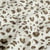 Tissu Double gaze de Coton motif panthère Taupe et Beige sur fond Blanc cassé