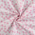 Tissu Coton imprimé Fleurs indiennes roses sur fond Blanc