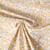 Tissu Popeline de Coton légère floral printanier jaune sur fond Blanc