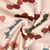 Tissu Maille Jersey Coton Baby petites chenilles sur fond Beige