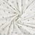 Tissus Jersey Coton imprimé Branches sur fond Blanc cassé