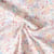 Tissu Popeline de Coton légère Petites fleurs et feuilles aquarelle pastel sur fond Blanc cassé