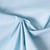 Tissu Popeline de Coton légère Tapis floral sur fond Bleu ciel