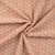 Tissu Gaze de Coton Fleurs brodées sur fond Saumon