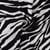 Tissu Viscose imprimé Motif zébré sur fond Noir