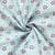 Tissu Double gaze de Coton Fleuris lilas sur fond Bleu ciel
