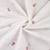 Tissu Voile de Coton brodé ajouré Fleurs roses et vertes sur fond Blanc