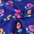 Tissu Jersey Coton Poppy Fleurs oranges et rose fluo sur fond Bleu roi