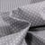 Tissu Coton enduit Petits pois blancs sur fond Gris foncé