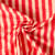 Tissu Coton Seersucker Rayé Pêche sur fond Rouge