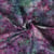 Tissu Coton imprimé Batik Aquaflow sur fond Violet foncé - Au mètre