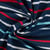 Tissu Sweat léger envers gratté Rayé Bleu, Blanc et Rouge sur fond Bleu marine