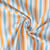 Tissu Coton imprimé Arty Lydia rayures Bleu et Orange sur fond Blanc