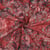 Tissu Batik de Coton rosaces et spirales Gris bleuté sur fond Rouge tomette