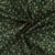 Tissu Coton imprimé motifs de Noël dorés sur fond Vert sapin