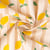 Tissu Coton imprimé Citrons jaunes et rayures sur fond Ecru