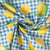 Tissu Coton imprimé Carreaux bleu et citrons, oranges jaunes sur fond Blanc