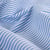 Tissu Coton légèrement extensible petites rayures Bleu ciel sur fond Blanc