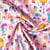 Tissu Popeline de Coton Dessin d'enfant sur fond Rose