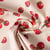 Tissu Toile Polycoton enduit Tomates cerise sur fond Naturel