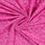 Tissu Maille motif léopard éponge sur fond Rose fuchsia