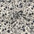 Tissu Popeline de Bambou Célestine motif floral Noir sur fond Ecru
