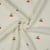 Tissu Fausse fourrure Mouton Lison cerises Rouges sur fond Ecru