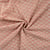Tissu Gaze de Coton motifs brodés sur fond Saumon