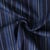 Tissu Jeans Denim Ninon rayures Bleues sur fond Bleu marine
