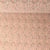 Tissu Fausse fourrure Mouton Toundra moucheté Orange et Noir sur fond Beige