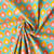 Tissu  Coton imprimé Arty Luka orange sur fond Vert jade