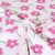 Tissu Popeline de Coton Fleurs roses et vertes sur fond Ecru