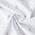 Tissu Pique de Coton  Nube Panpan sur fond Blanc