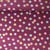 Tissu Jersey Bord Côte Yasmine fleurs Dorées sur fond Bordeaux