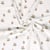 Tissu Jersey Coton imprimé Alix fleurs délicates sur fond Blanc cassé