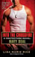 Into the Crossfire - A Protectors Novel: Navy SEAL