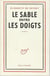Le sable entre les doigts
