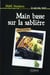 Main basse sur la sabliere